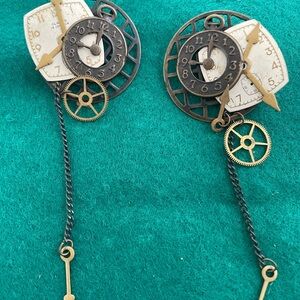 Earring clocks + pin for pierced ears.  4" drop 1-3/4" wide.  Movable hands.